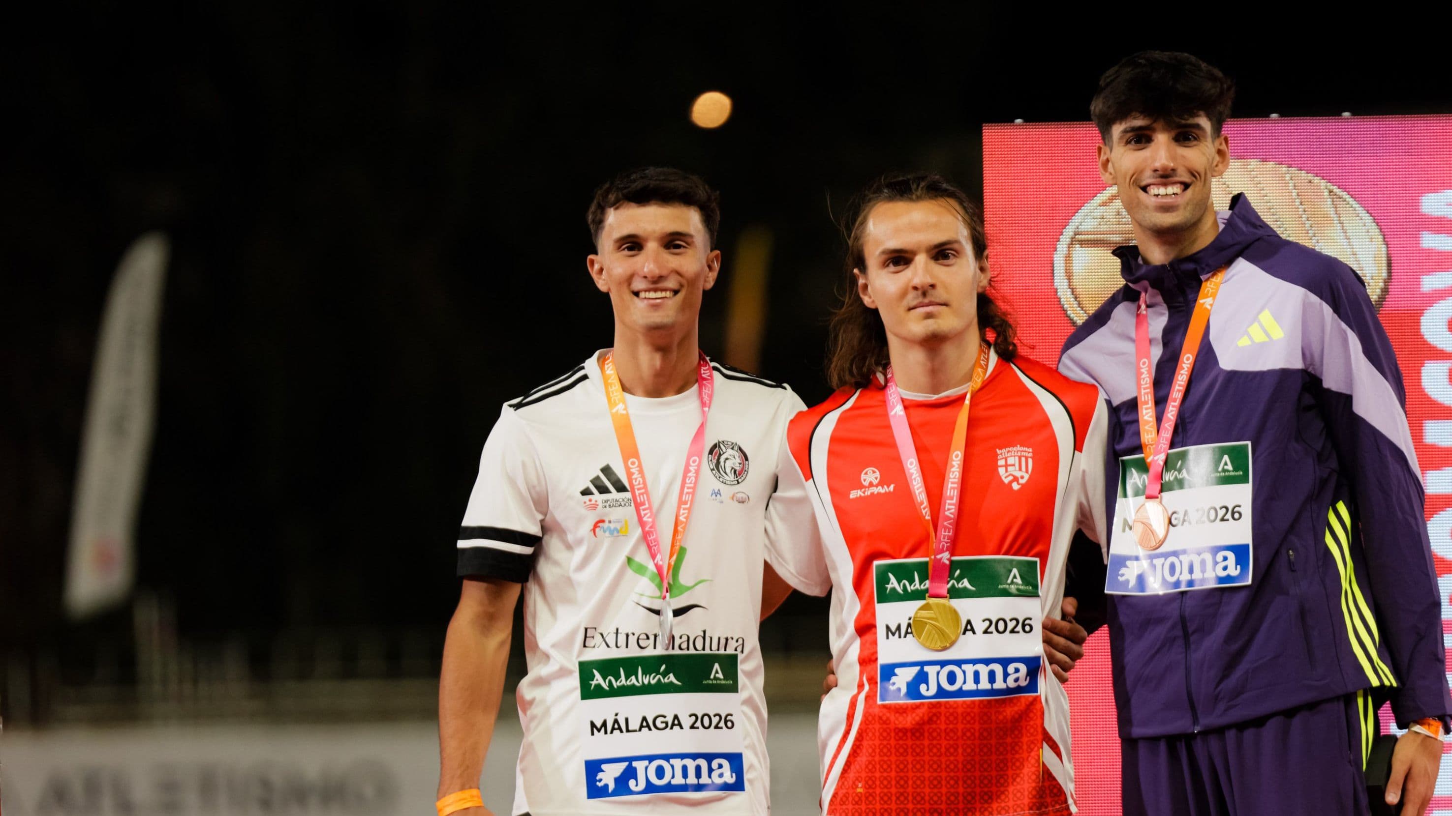 Podio de los 100 metros masculinos con Guillem Crespí, Jorge Hernández y Abel Jordán